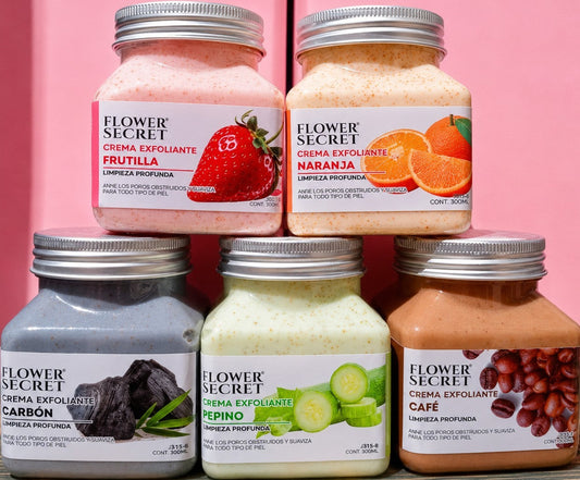 Colección de cremas exfoliantes Flower Secret de ÉL&ELLA MAKEUP Y ACCESORIOS con aromas de frutilla, naranja, carbón, pepino y café.